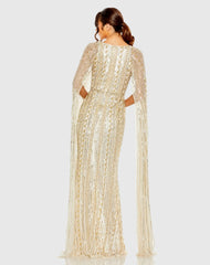 Beige and Silver Sequined V-Neck Gown with Cape Sleeves