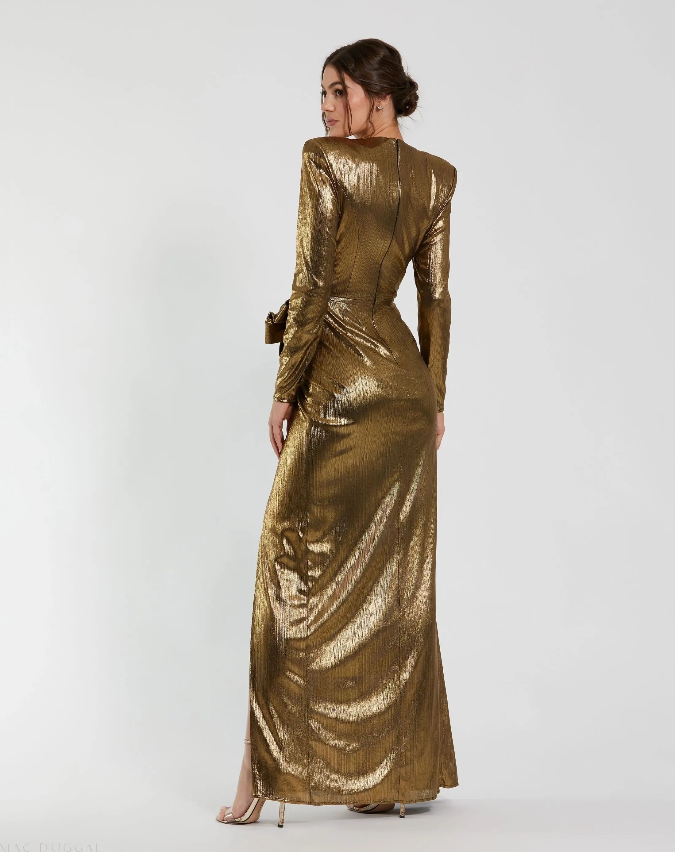 Gold Metallic Long Sleeve Gown With Bow